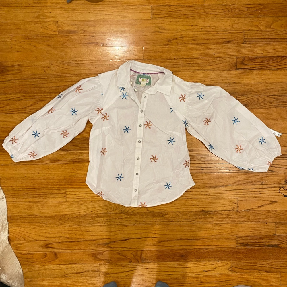 Anthropologie white blouse with sequin star pattern